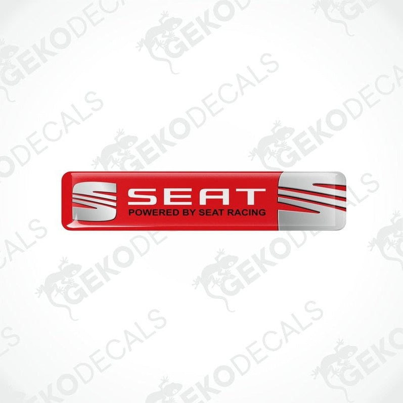  Rectangular vinyl decals with a polyurethane coating, featuring the text 'SEAT POWERED BY SEAT RACING' in a  red, and white color scheme.