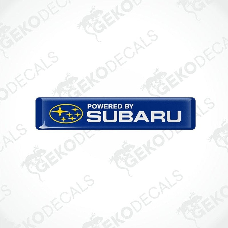 Blue vinyl stickers with the text 'POWERED BY SUBARU' and the Subaru logo.