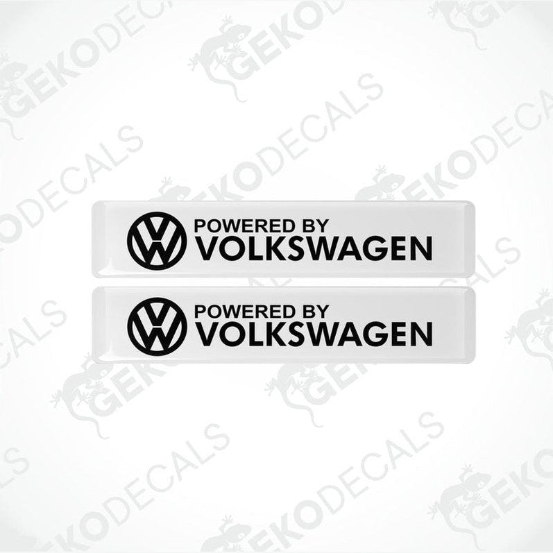 Two withe vinyl decals with the black text 'POWERED BY VOLKSWAGEN' and the Volkswagen logo.