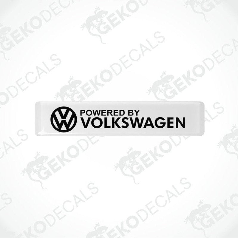 Withe vinyl decals with the black text 'POWERED BY VOLKSWAGEN' and the Volkswagen logo.