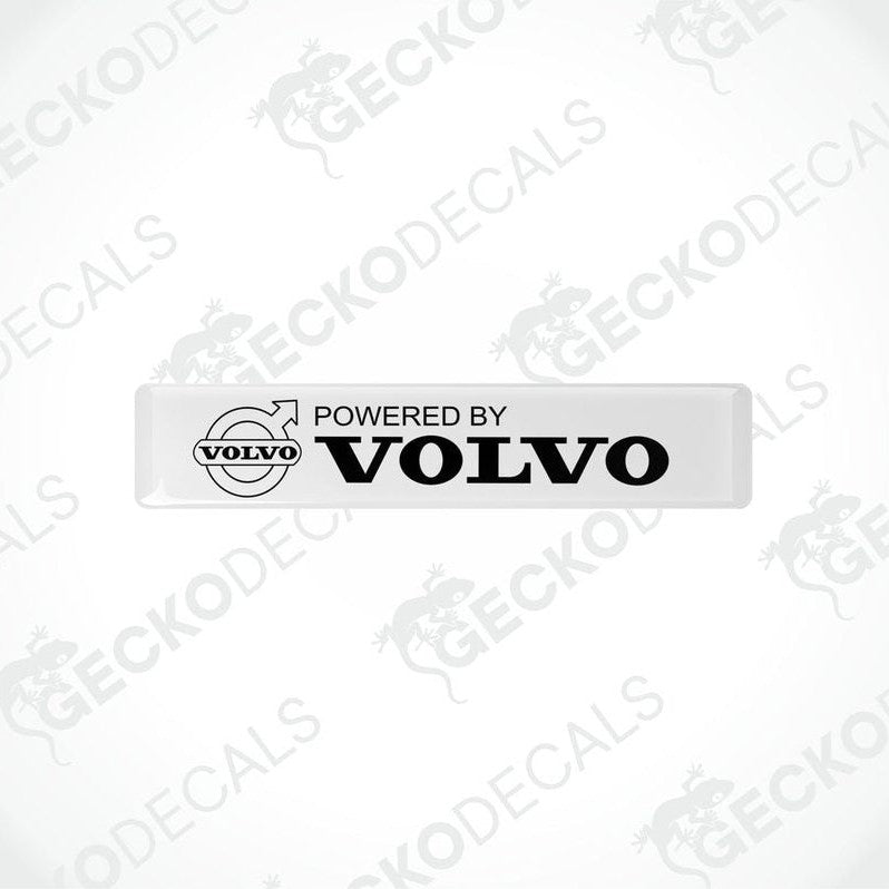 Withe vinyl stickers with the text 'POWERED BY VOLVO' and a Volvo logo.