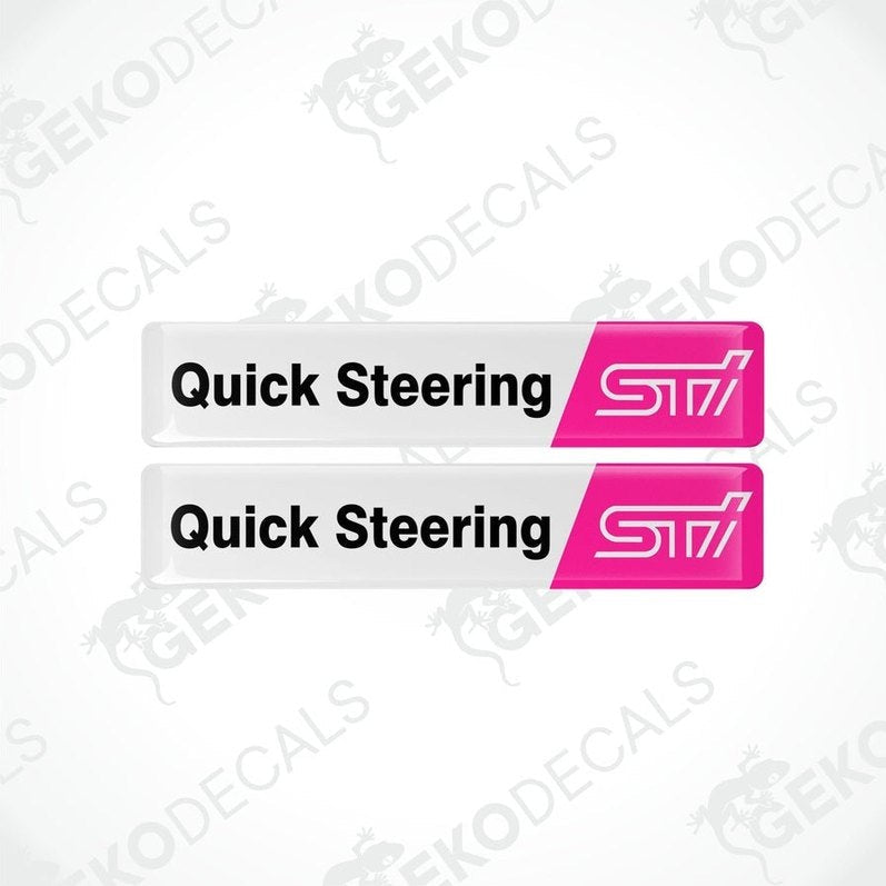Two withe vinyl stickers with the words 'QUICK STEERING' and 'STI' in pink lettering.