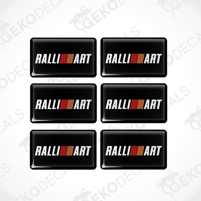 A set of six black vinyl stickers with a three-dimensional RALLIART logo 