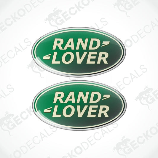 Two green oval-shaped vinyl decals with the text 'RAND LOVER' in white and silver.