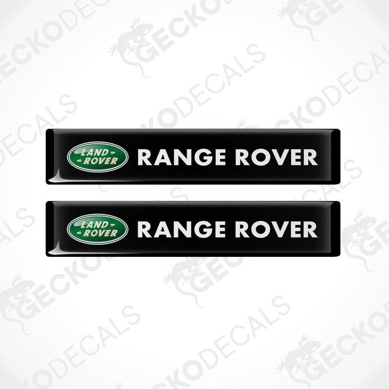 Two black vinyl stickers with the Range Rover logo printed on them.