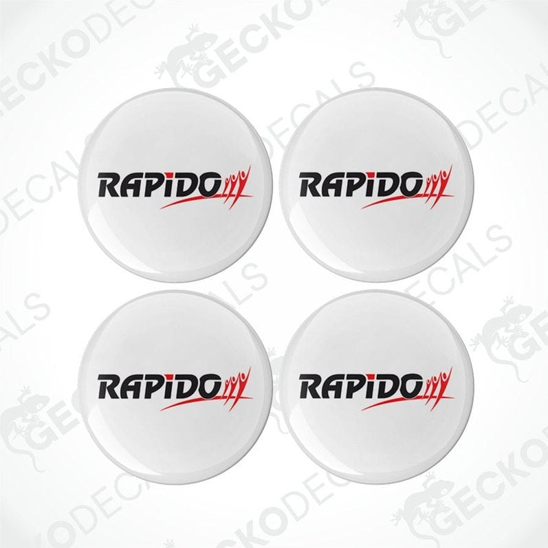 Four white vinyl decals with the word 'RAPIDO' and 'RAPIDO CARAVANS' printed in red and black.