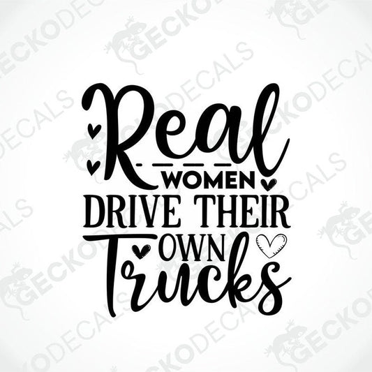 A black decal with the text 'Real women drive their own trucks' arranged in a playful, feminine design with heart accents.