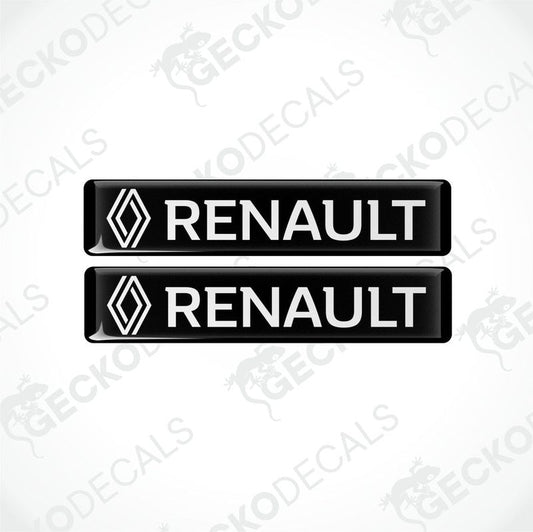 Two black and white rectangular car decals with the RENAULT logo