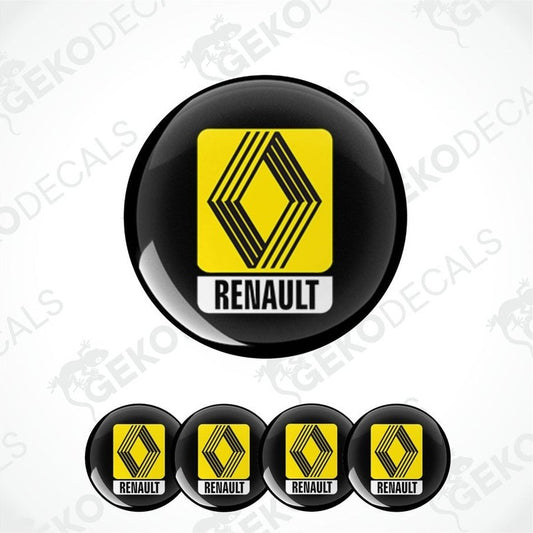 A set of four round vinyl stickers with a ryellow and white renault trucks logo on a black background.