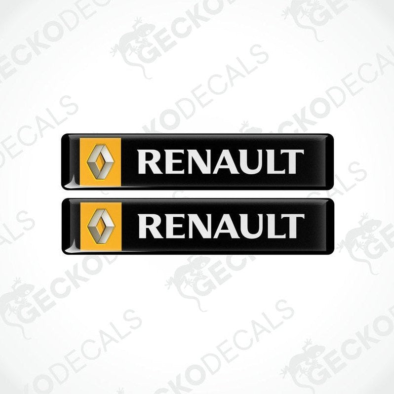 Two black vinyl stickers with the RENAULT logo in yellow.