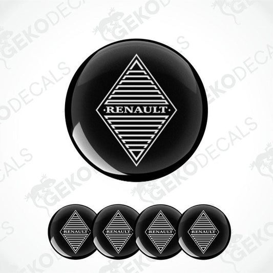 A set of four black vinyl stickers with the RENAULT brand logo on them.