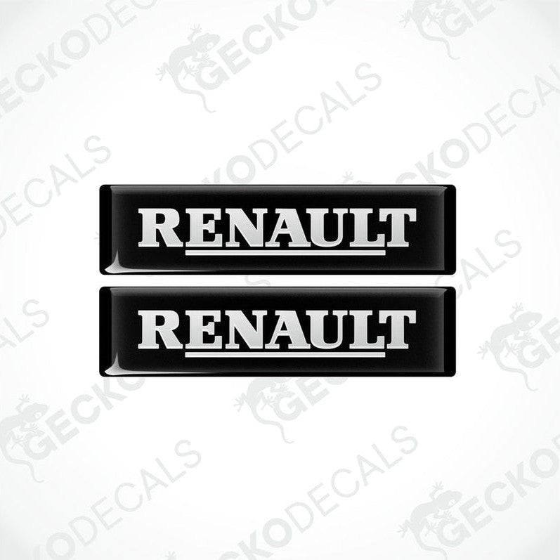 Two black vinyl stickers with the word 'RENAULT' written in white.