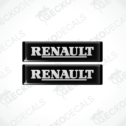 Two black vinyl stickers with the word 'RENAULT' written in white.