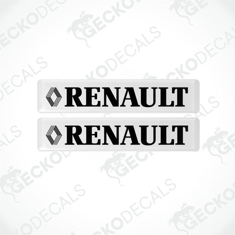 Two withe vinyl stickers with the word 'RENAULT' and a diamond logo design.