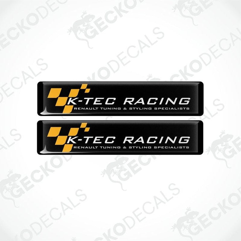 Two black, yellow, and white racing decals with the text 'K-TEC RACING' and checkered flag design.