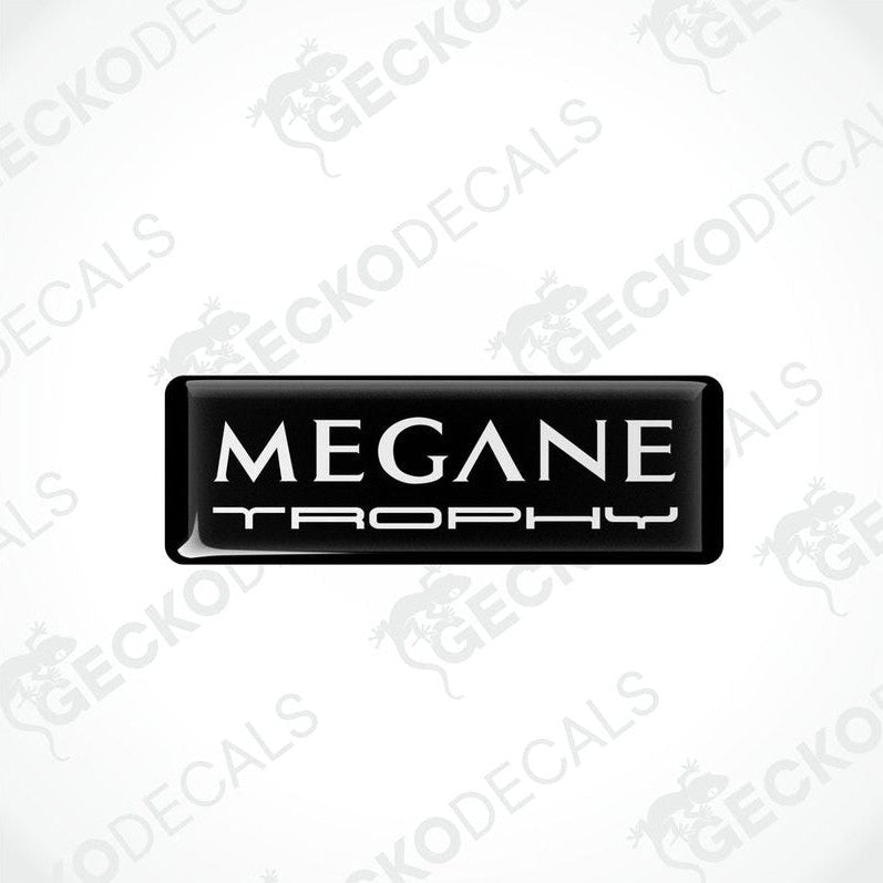  Black rectangular vinyl decals with 'MEGANE TROPHY' white text on them, intended for use as car stickers.