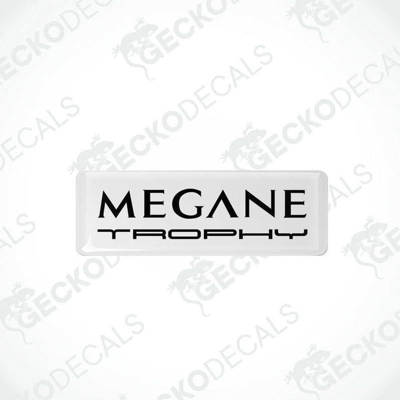  Withe rectangular vinyl decals with 'MEGANE TROPHY'black text on them, intended for use as car stickers.