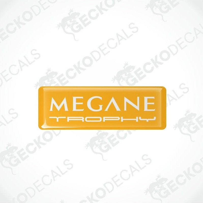 Yellow rectangular vinyl decals with 'MEGANE TROPHY'withe text on them, intended for use as car stickers.