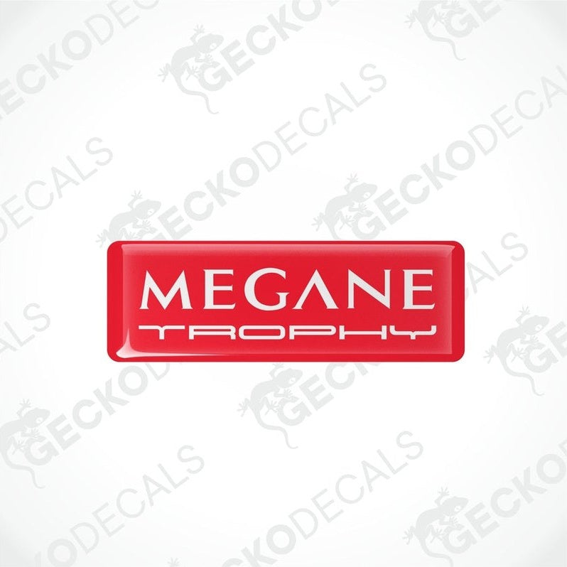 Red rectangular vinyl decals with 'MEGANE TROPHY'withe text on them, intended for use as car stickers.