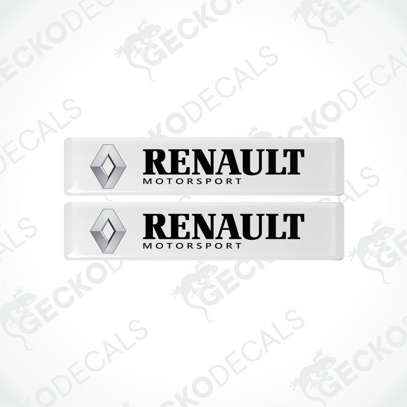 Two withe vinyl stickers with the Renault Motorsport logo printed on them.