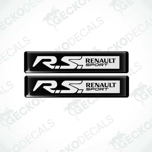 Two black and white vinyl decals with 'RS Renault Sport' text on them, placed on a white background.