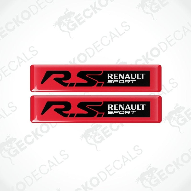 A pair of red vinyl stickers with the RENAULT RS SPORT logo printed in black.
