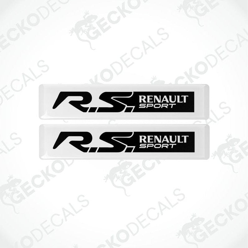 Two withe and black vinyl decals with 'RS Renault Sport' text on them, placed on a white background.