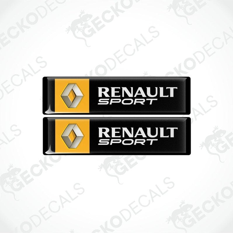 Two vinyl stickers with the RENAULT SPORT logo, one with a yellow background and the other with a black background, both with the gecko decals logo at the bottom.