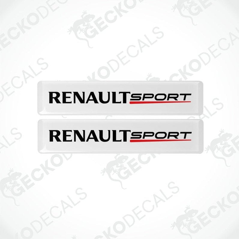 Two withe vinyl stickers with the text 'RENAULT SPORT' in black and red logos.