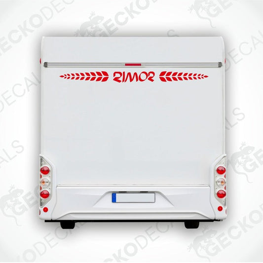 A white Rimor caravan with a red and white decal on the rear side, featuring the Rimor logo and the word 'SIMOR' in large letters.