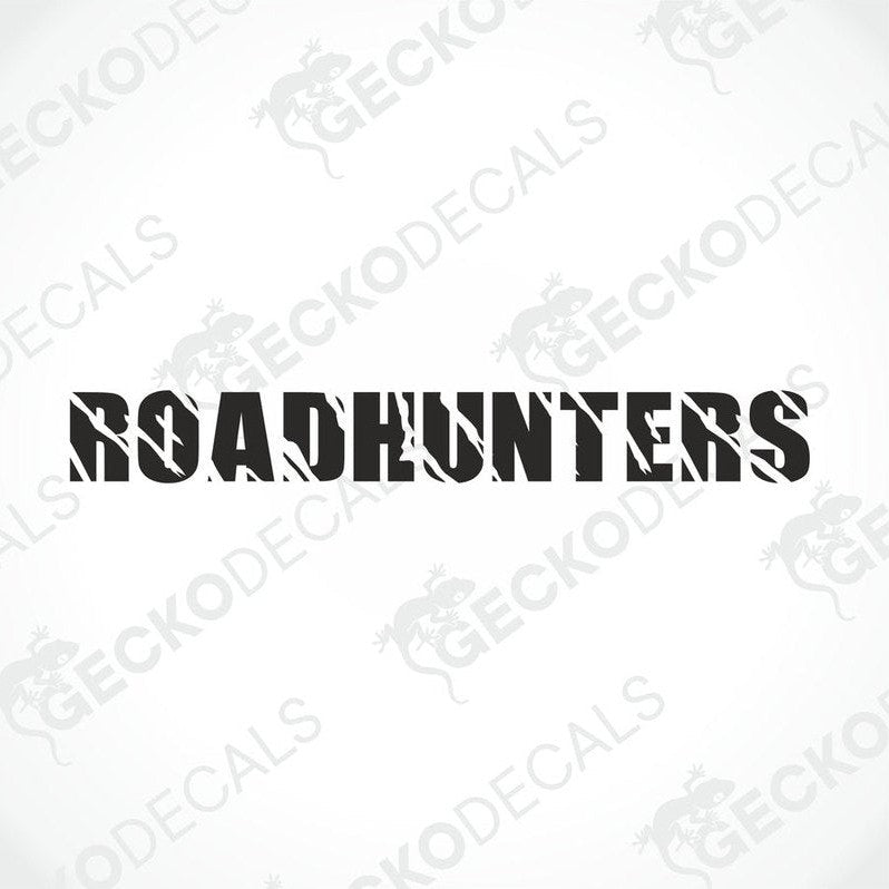 A die cut decal with the text 'ROADHUNTERS' displayed on the front of a gray truck's windscreen.