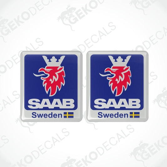 Two square-shaped blue car decals with the SAAB Sweden logo and a small Swedish flag.
