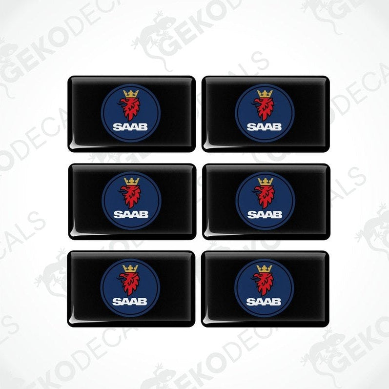 A set of six black vinyl decals with the SAAB logo in red and blue.