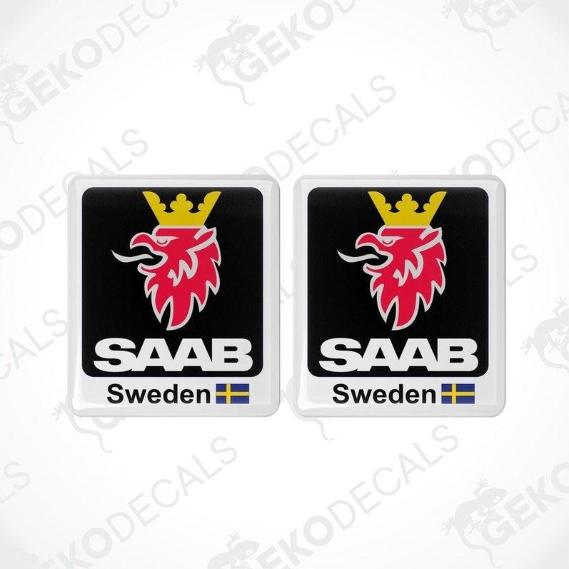 Two domed vinyl stickers with a red and black design, featuring the SAAB brand logo and the text 'SWEDEN'.