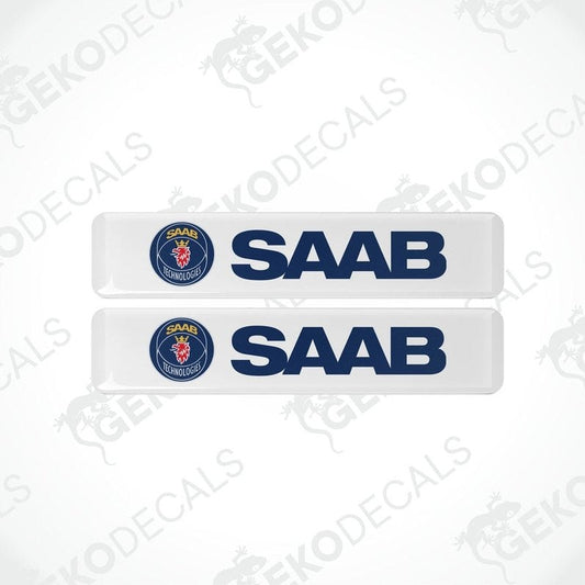 Two white vinyl stickers with a blue and red 'SAAB' logo, arranged horizontally.