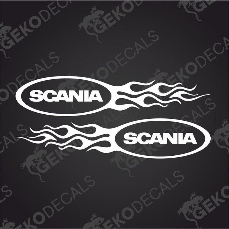 A pair of white decal stickers with the brand name 'Scania' written in bold, and tribal flame designs on each side, intended for use on vehicles.