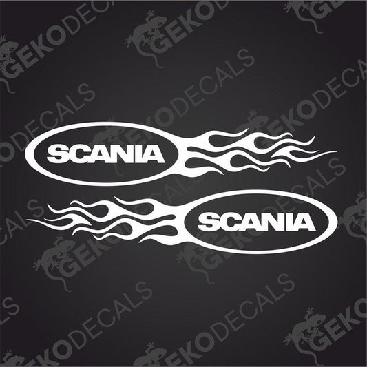 A pair of white decal stickers with the brand name 'Scania' written in bold, and tribal flame designs on each side, intended for use on vehicles.