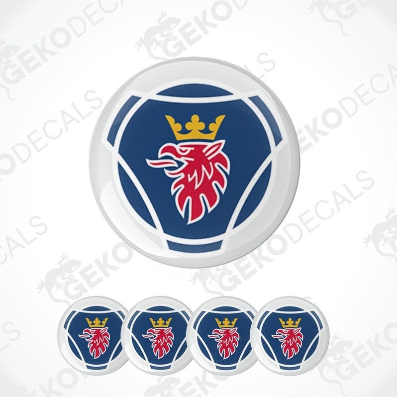 A set of round vehicle decals with a blue and red design featuring a crown and a stylized Scania Eagle head.