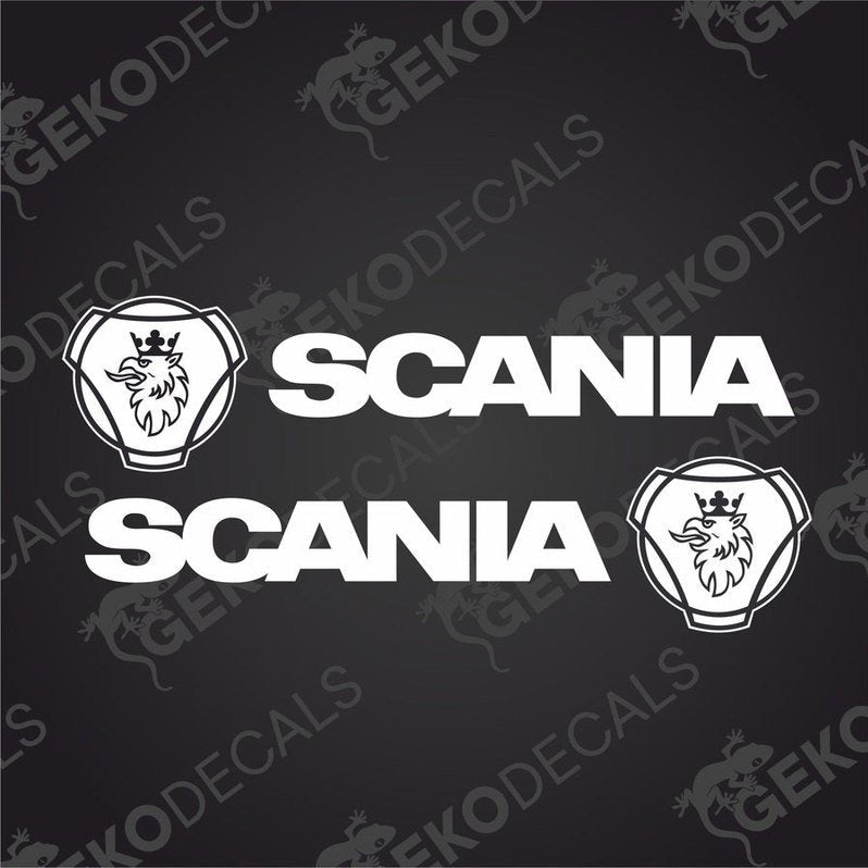 Two white decal stickers with the Scania brand logo and name, one for the right and one for the left side, placed on a dark background.