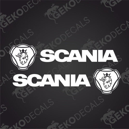 Two white decal stickers with the Scania brand logo and name, one for the right and one for the left side, placed on a dark background.