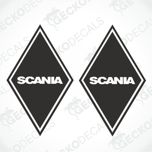 Two black and white diamond-shaped decals with the brand name 'SCANIA' written in uppercase letters