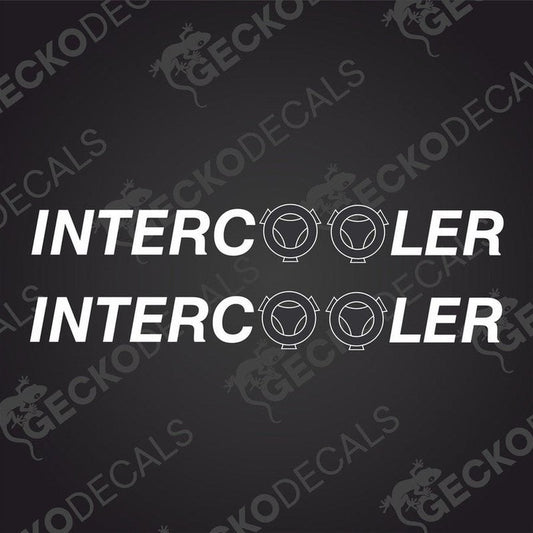 Two white decals with the word 'INTERCOOLER' and the SCANIA truck logo printed on them, designed for use on vehicles.
