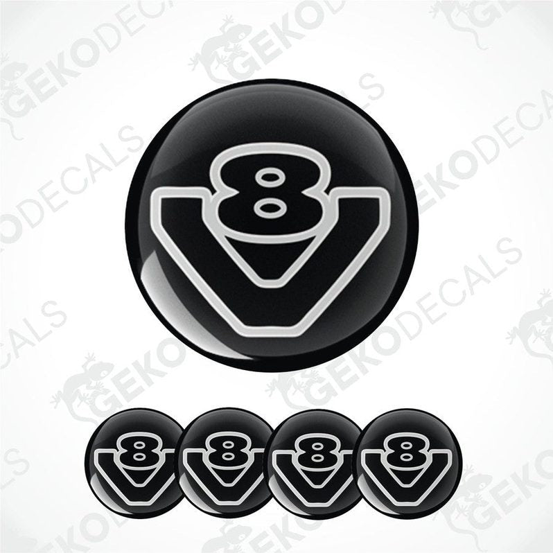 A set of four black vinyl stickers with a white design, including the text 'V8' and a Scania logo.