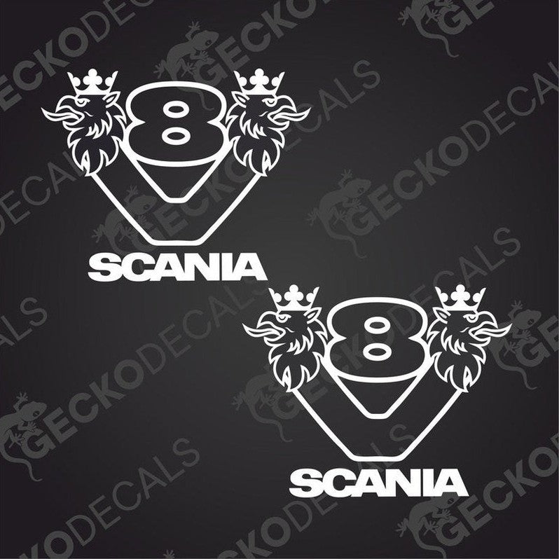 Two white decal stickers with the Scania V8 logo on a dark background.