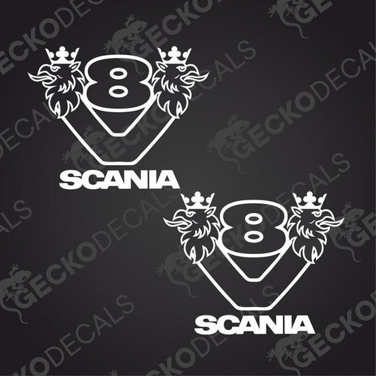 Two white decal stickers with the Scania V8 logo on a dark background.