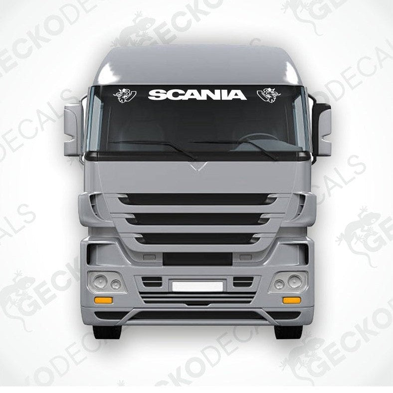 A front view of a Scania truck with the brand name 'SCANIA' displayed on the windscreen.