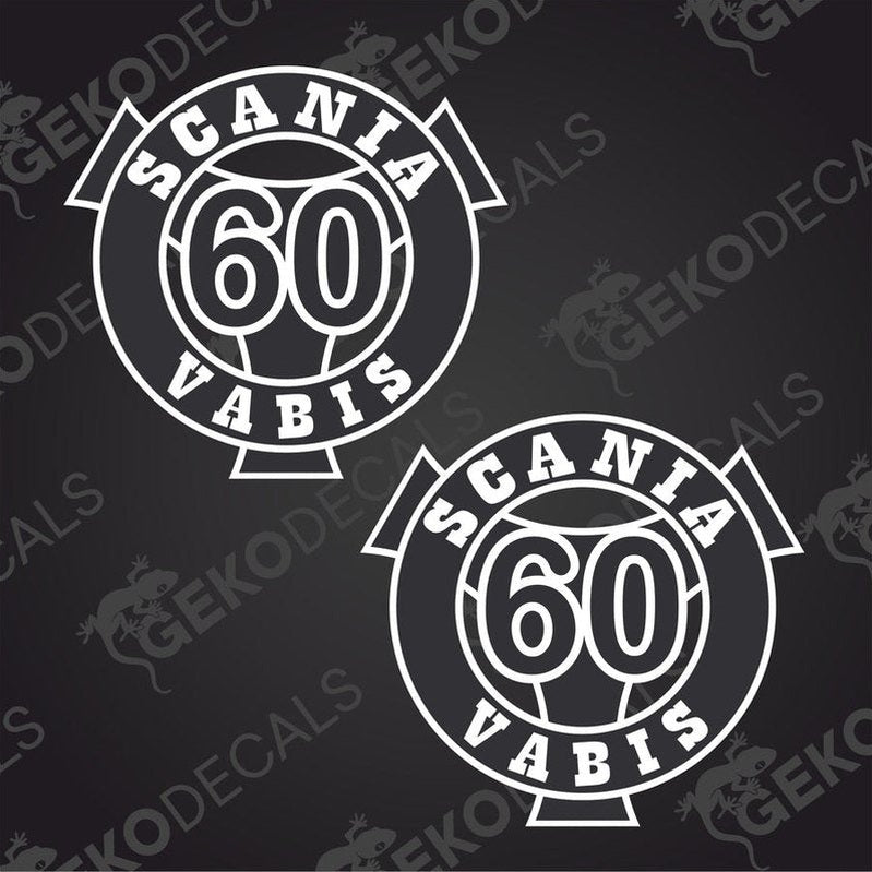 Two round white decals with the text '60' and 'SCANIA VABIS'. The decals have a geometric design with a border and the brand logo.