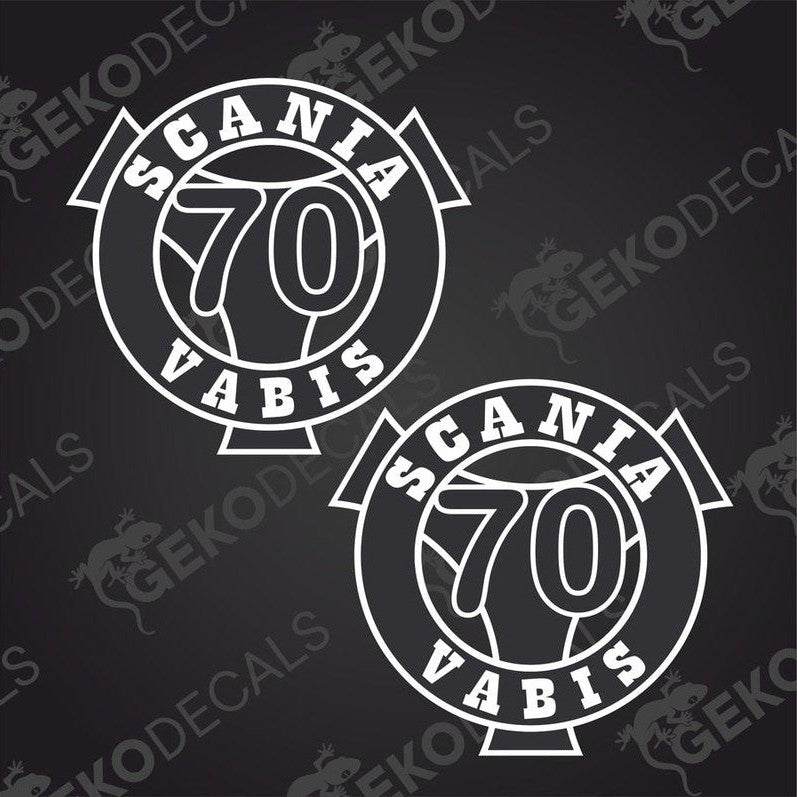 Two white decals with the text 'SCANIA VABIS 70' on a dark background.
