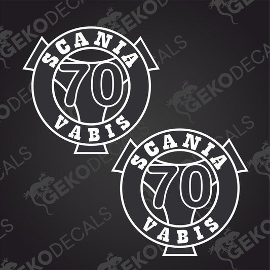 Two white decals with the text 'SCANIA VABIS 70' on a dark background.