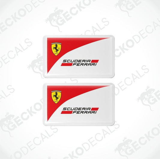 Two vinyl decals with a red and white design featuring the Scuderia Ferrari logo.